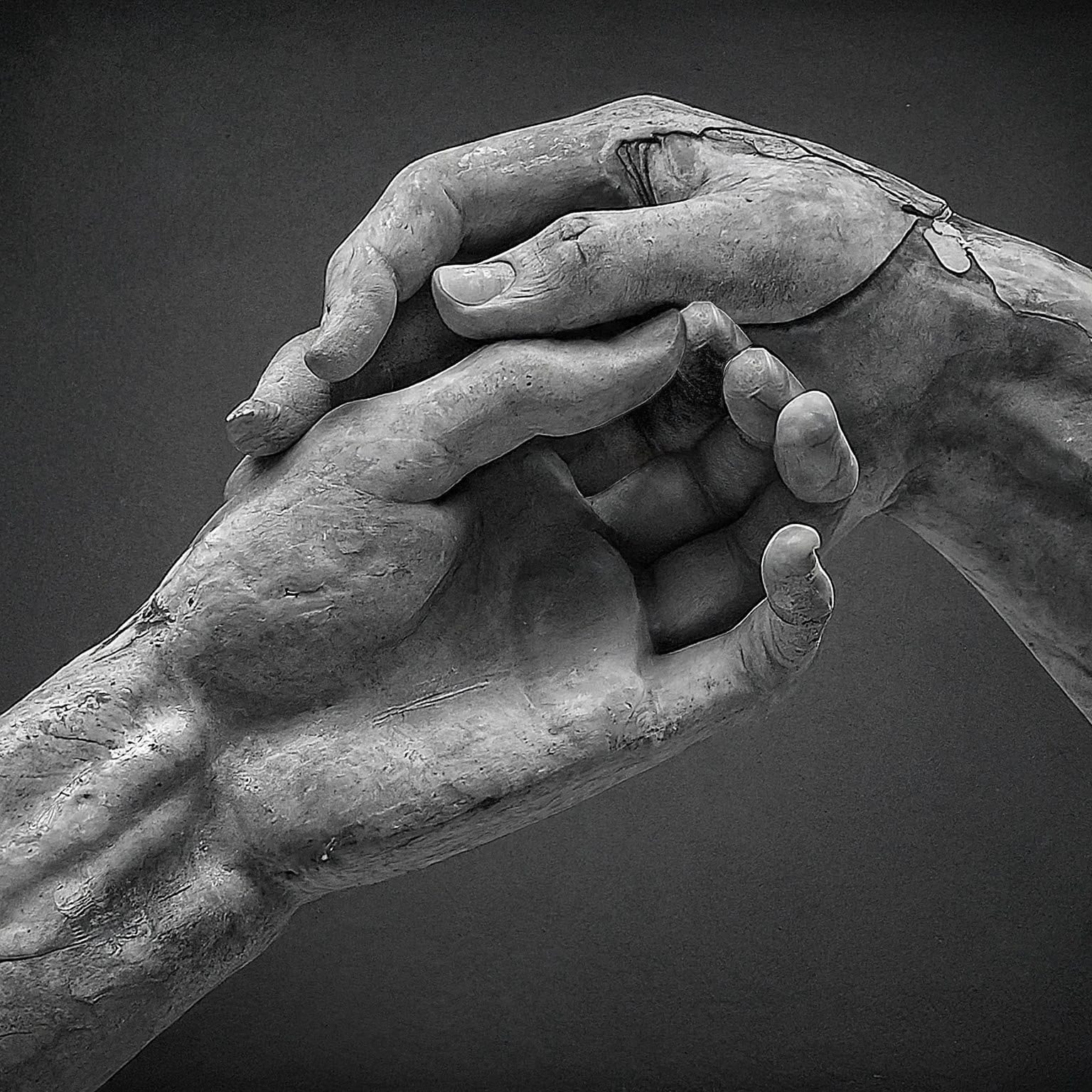 Hands of Pompeii lovers touch