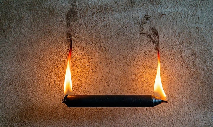 A candle burning on both ends